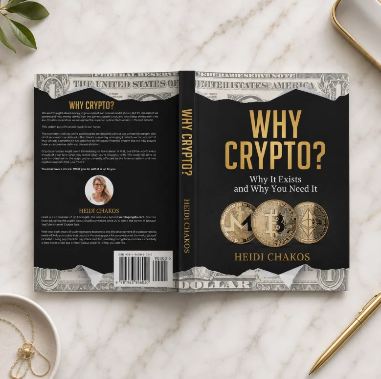 Front and back cover of "Why Crypto?" by Heidi Chakos on a marble desk, showing the author bio and description of this best crypto book for beginners.